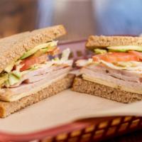 Baja Chipotle Turkey · Turkey, pepper Jack cheese, avocado, shredded cabbage, chipotle lime mayo, red onion and tom...