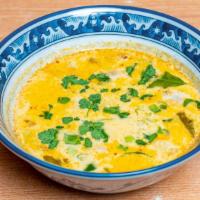 Tom Kha · Coconut milk soup with galanga, lime, lemongrass, mushrooms and cilantro. Choose tofu or chi...