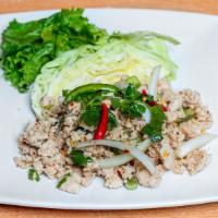 Larb · Grounded meat tossed in a lime dressing with onions and cilantro. Choose from chicken or por...