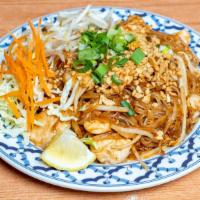 Pad Thai · Rice noodles stir-fried with egg and bean sprouts. Topped with peanuts and green onions. Cho...