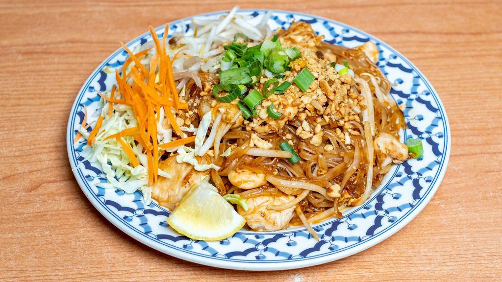 Pad Thai · Rice noodles stir-fried with egg and bean sprouts. Topped with peanuts and green onions. Choose from tofu, chicken or pork. Beef or prawns for an additional charge.