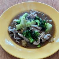 Rad Na · Fresh wide noodles stir-fried with broccoli and topped with a Thai style gravy. Choose from ...