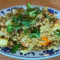 Curry Fried Rice · Egg, onions, pineapple, curry powder and prawns.