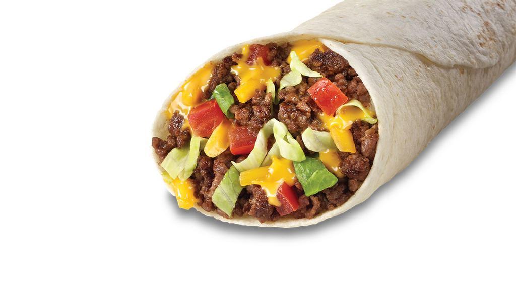 Soft Taco · Seasoned beef or pork carnitas; a soft flour tortilla filled with cheddar cheese, shredded lettuce, and diced tomatoes.
