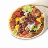 Super Soft Taco - Beef · A soft flour tortilla filled with refried pinto beans, cheddar cheese, lettuce, tomatoes, an...