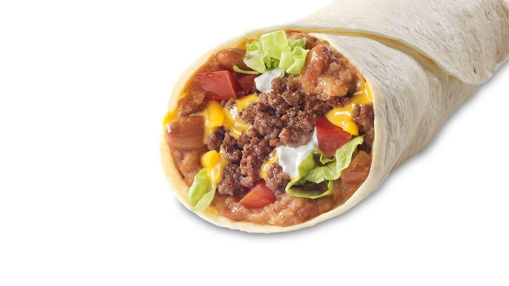 Super Soft Taco · Seasoned beef, chicken, or pork carnitas: a soft flour tortilla filled with refried pinto beans, cheddar cheese, lettuce, tomatoes, and sour cream.