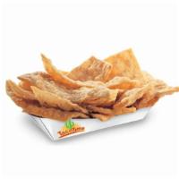 Cinnamon Crustos® · Golden wedges of fried flour tortilla covered in cinnamon and sugar.