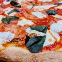 Margherita · Pizza sauce, fresh mozzarella, sliced tomato, basil, olive oil.