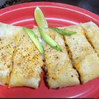 Quesadilla Fingers · Choose meat , it came with frijoles con veneno, chorizo, houses dressing, and grill onions t...