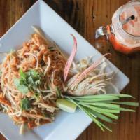 Pad Thai · Stir fried thin rice noodles, bean sprouts, peanuts, and chives in our signature pad thai sa...
