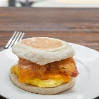 Bacon, Egg, And Cheese Sandwich · Nitrate-free bacon strips with sharp cheddar cheese, cage-free egg on a whole grain English ...