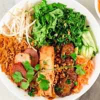 Bún Thập Cẩm · Rice Vermicelli Noodle Salad with Grilled Marinated Pork, Ground Shrimp, Egg Roll, Shredded ...