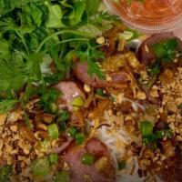 Bún Nem Nướng · Rice Vermicelli Noodle Salad with Grilled Pork Sausage + Fresh Herbs, Crunchy Pickled Carrot...