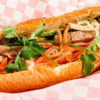 Bánh Mì Đặc Biệt · Bread Stuffed with Combination Ham, Pork, Spread of Liver Pate, Mayonnaise, Pickled Veggies,...