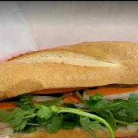 Bánh Mì Heo Nướng · Bread Stuffed with Grilled Pork, Mayonnaise, Pickled Veggies, Mixed Vegetable and Herbs.