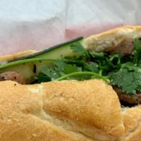 Bánh Mì Bò Nướng · Bread Stuffed with Grilled Beef, Mayonnaise, Pickled Veggies, Mixed Vegetable and Herbs.