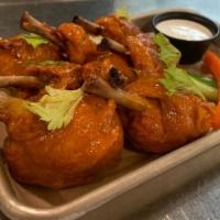 Chicken Lollipop · 6 count of Chicken lollipops. Comes with choice of blue cheese or ranch.