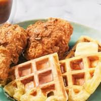 Chicken & Waffles · Three piece chicken prepared southern style with two golden waffles.