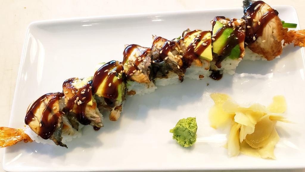 Dragon Roll · Shrimp tempura roll topped with unagi, avocado, unagi sauce