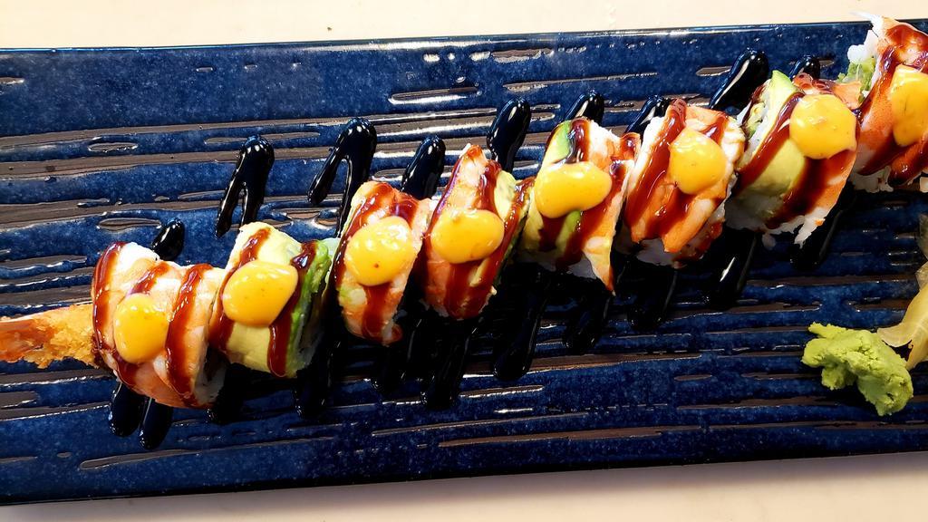 Tiger Roll · Shrimp tempura roll topped with ebi, avocado, unagi sauce