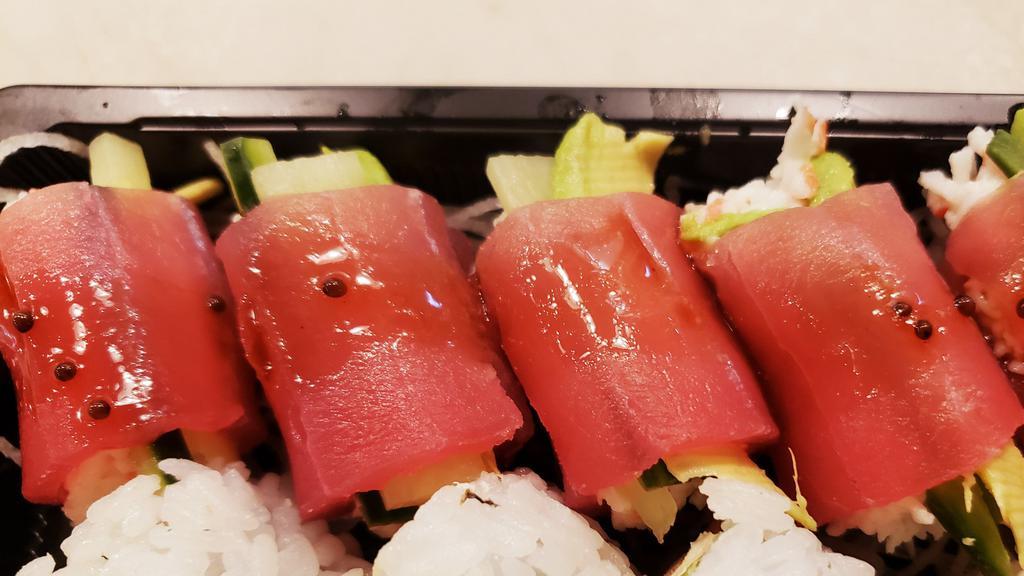 Pinkbucks · (5pcs) crab, avocado, cucumber wrapped with tuna, wasabi dressing