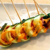Lollipop  · (6pcs) avocado, assorted fish, crab wrapped with cucumber, wasabi dressing, spicy mayo