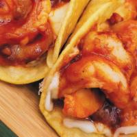 Devilish Tacos / Tacos Endiablados · Order of three tacos with shrimp a la diabla and mozzarella cheese on corn tortillas. / Orde...