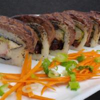 Roll De Bistec / Steak Roll · Inside: philadelphia, avocado, breaded shrimp and tempura chives. On the outside: slices of ...