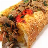 The Cheesesteak Sub · Cheesesteak is served with grilled onions, grilled peppers, mayo, white American cheese.