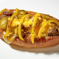 The Jalapeño Cheesesteak · Cheesesteak is served with chopped jalapeños, grilled onions, grilled peppers, mayo, white A...