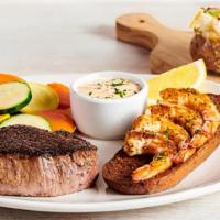 Sirloin* & Coconut Shrimp · Our signature center-cut sirloin with Gold Coast Coconut Shrimp. Served with two freshly mad...