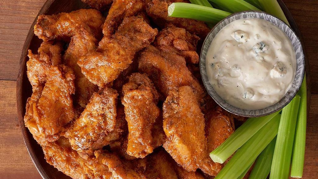 Kookaburra Wings® Party Platter · 30 chicken wings tossed in our secret spices served with our Blue Cheese dressing and celery. Choose mild, medium or hot. Serves 4 - 6.