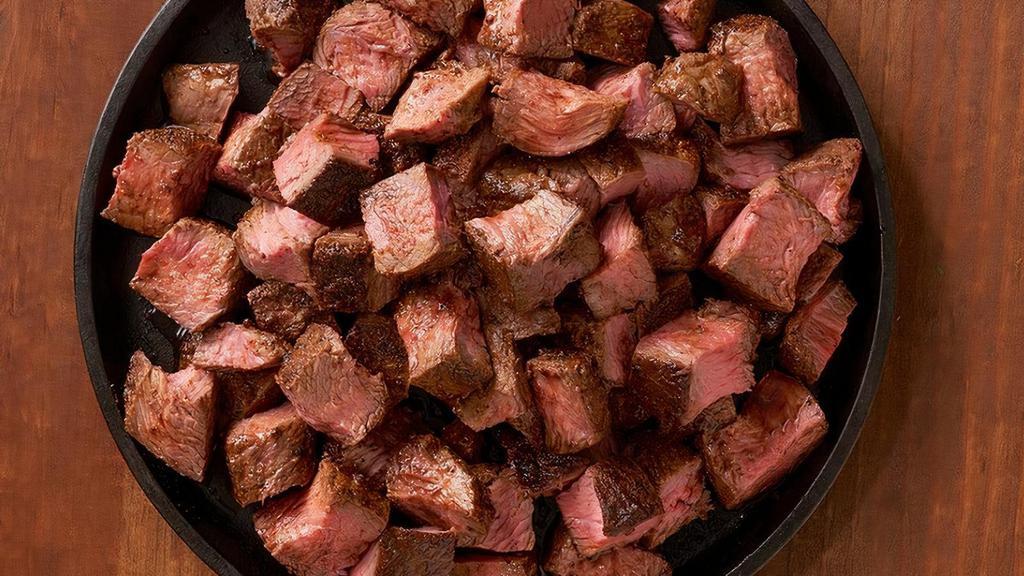 Center-Cut Sirloin Party Platter 30Oz · Center-cut for tenderness. Lean, hearty and full of flavor. Seasoned and seared. Served diced and ready to eat. Serves 4 - 6.