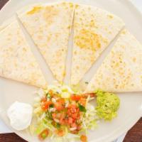 Quesadilla · One large soft flour tortillas with jack cheese, guacamole, sour cream, tomatoes and onions.