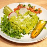 Fresh Guacamole · Fresh avocado, pico de gallo, cilantro, cotija.  Comes with chips