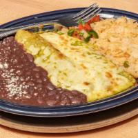 Spinach Enchiladas · Sautéed spinach, red onions and yellowsquash, blend of cheeses, tomatillo sauce.