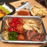 Large Fajita  Pack · Feeds 5-8. Mix and match 2 proteins- grilled steak, grilled chicken, grilled portabella and ...