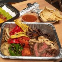 Large Fajita Combination · Great option to try all our fajita offering flavors.  Includes grilled steak, grilled chicke...