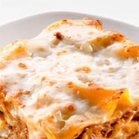 Lasagna · Lasagna, topped with sauce, Mozzarella and parmesan cheese.