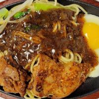 Teppan Chicken · Pan fried chicken steak with sauté vegetables and onions on a bed of noodles/rice. Choice of...