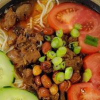 Chicken Gizzard Noodles · Chicken gizzards in bone broth with noodles and vegetables.