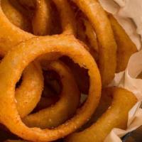 Onion Rings (Vegetarian) · Battered and Fried, served with a side of house made Bayou sauce