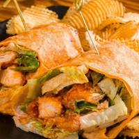 Buffalo Chicken Wrap · Breaded boneless chicken strips, Parmesan cheese, hot sauce, romaine lettuce, peppercorn ran...