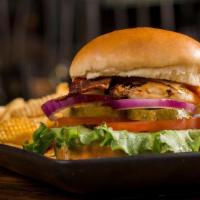 Rock Chicken Sandwich · Grilled chicken breast, bacon, Swiss cheese, red onion, tomato, lettuce, pickle, The Rock Bu...