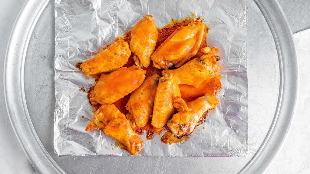 Chicken Wings · Ten wings. Choice of hot or BBQ.
