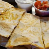 Chicken Quesadilla · Served with salsa and sour cream.