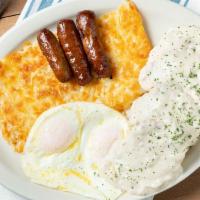 Biscuits & Gravy · Two large biscuits and sausage country gravy and served with two eggs. And a choice of bacon...