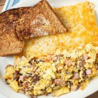 Belltown Scramble · A robust, meaty scramble cooked with ham, bacon, sausages, fresh mushrooms, chopped onions, ...