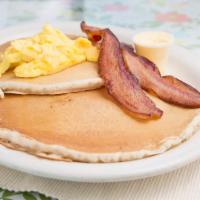Mini Pancake Plate · One fluffy buttermilk pancake served with one fresh egg, your choice of two thick honey-cure...