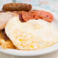 British Breakfast · A distinguished traditional British-style breakfast with British banger sausage, ham, bacon,...